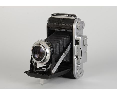 A Ross Ensign Selfix 820 Special Rangefinder Camera, chrome, serial no. E38573, with Ross Xpres f/3.8 105mm lens, serial no. 