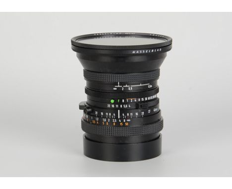 A Carl Zeiss Distagon CF T* f/4 40mm Lens, black, serial no. 6669287, body, VG, shutter working, some very light fungal marks