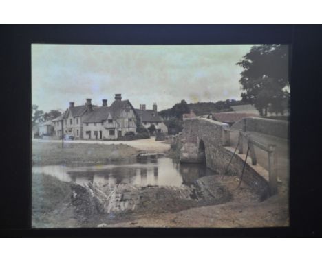 Arthur E Morton Colour Plates, Kent - Autochrome - Eynsford, view acros river by bridge and Otford church, dated 1913, half-p