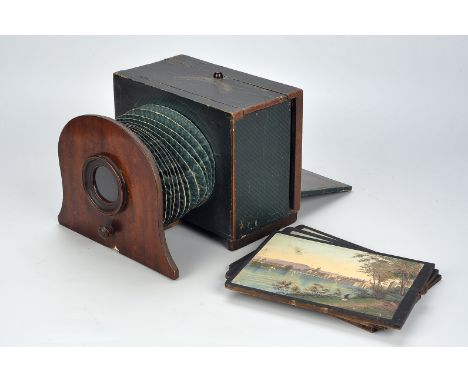 A Polyorama Panoptique lithographed paper-covered wood ‘Hold to Light’ Viewer, with twelve paper transparencies, 220mm wide, 
