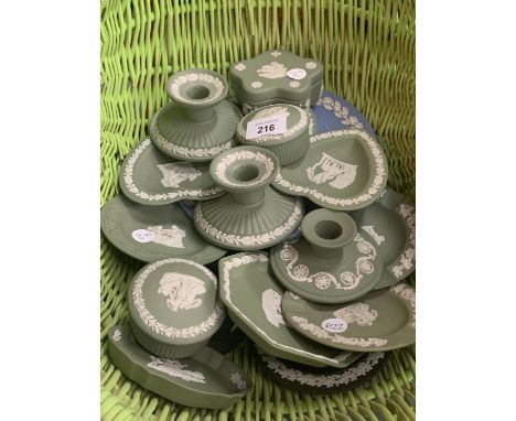 A BASKET OF VARIOUS WEDGEWOOD GREEN AND WHITE JASPERWARE ITEMS 