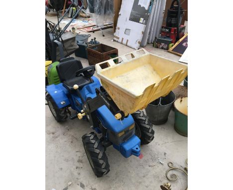 A CHILDS PEDAL TRACTOR WITH FORE END LOADER 