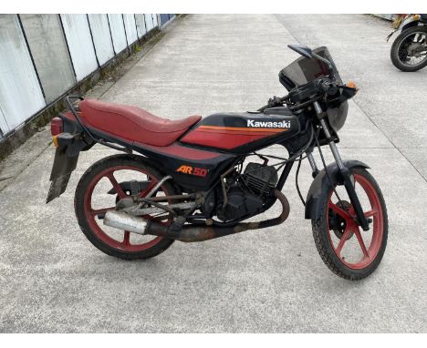 A 1987 KAWASAKI AR 50, ON A V5, BELIEVED GENUINE 1384 MILES, ENGINE KICKS OVER, GARAGE STORED FOR MANY YEARS 
