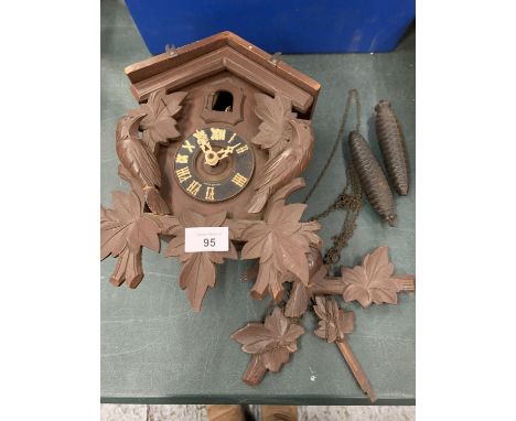 A BAVARIAN STYLE WOODEN CUCKOO CLOCK 