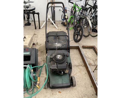 A PETROL ROTARY MOWER 