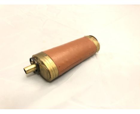 A BRASS AND LEATHER THREE WAY POWDER FLASK 