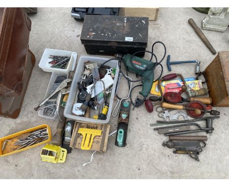 A BOSCH DRILL AND VARIOUS TOOLS 