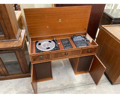 A DYNATRON RADIOGRAM WITH GARRARD DECK IN THE FORM OF A PEDESTAL DESK 