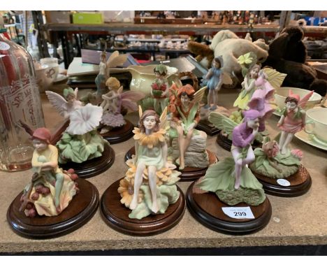 A SET OF ELEVEN HAND PAINTED CICELY MARY PARKER FLOWER FAIRIES FIGURINES TO INCLUDE A CARLTONWARE HAND PAINTED JUG 