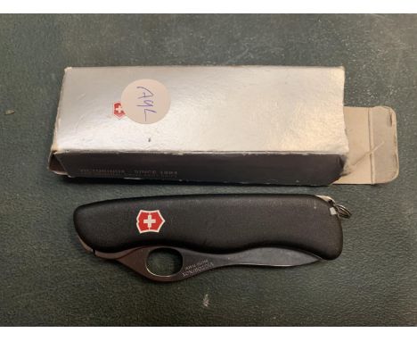 A BOXED SWISS VICTORINOX PENKNIFE 