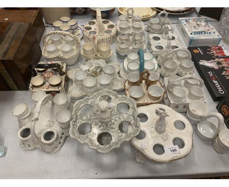 A COLLECTION OF CERAMIC EGG CUPS AND HOLDERS 