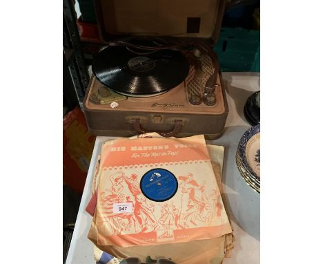 A VINTAGE REGENTONE HANDY-GRAM RECORD PLAYER AND VINTAGE RECORDS 