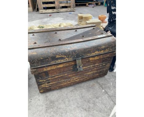 A VINTAGE METAL TRUNK 
