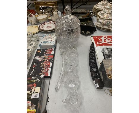 A LIDDED CRYSTAL PUNCH BOWL WITH LADLE AND FIVE MATCHING CUPS 