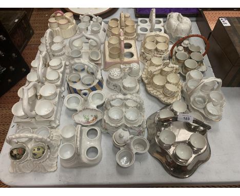 A COLLECTION OF CERAMIC EGG CUPS AND HOLDERS (SEVERAL A/F) 