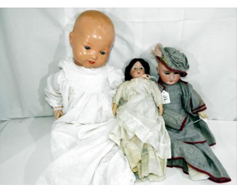 A collection of three good quality vintage dolls to include a boy Armand Marseille marked to the head AM, Germany 351/PF with
