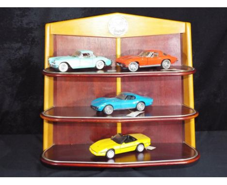 Diecast - Franklin Mint - a wall mounted display unit The Official History of the Corvette, also included in the lot is four 