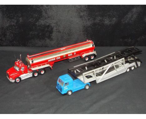 Diecast - Franklin Mint and other - two unboxed diecast 1:43 scale model trucks, including Franklin Mint 1:43 MACK Fire Hose 