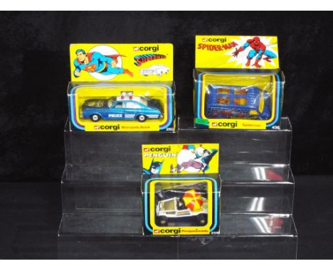 Diecast - Corgi - three vintage boxed Corgi vehicles, including 259 Superman Metropolis Buick, 260 Penguinmobile, 436 Spiderv