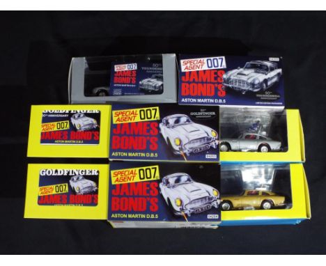 Diecast - three Corgi 1:43 scale James Bond Aston Martins comprising 04206, 04204 and 04203, items appear to be in near mint 