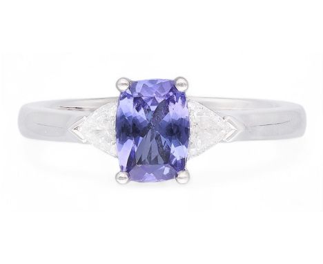 Platinum three stone cushion cut tanzanite and trilliant cut diamond ring, hallmarked, tanzanite 0.77 carat, total diamond we