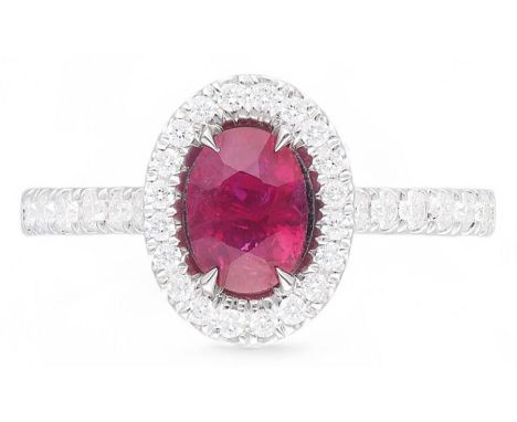 18ct white gold oval cut ruby and round brilliant cut diamond cluster ring, with diamond set shoulders, hallmarked, ruby appr
