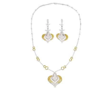 White and yellow gold round brilliant cut diamond pendant necklace, the fancy heart pendant, pave set with white and yellow d