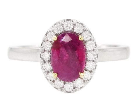 18ct white gold oval cut ruby and round brilliant cut diamond cluster ring, hallmarked, ruby approx 0.85 carat, total diamond
