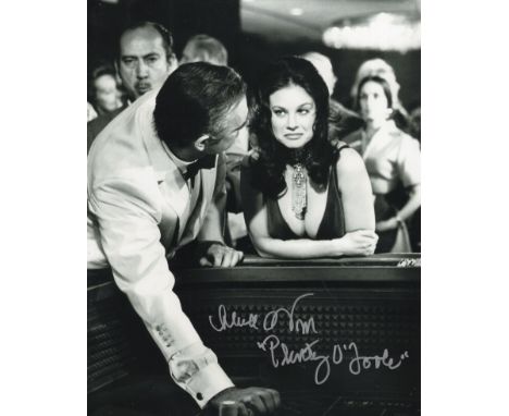 007 James Bond movie Diamonds are Forever 8x10 B/W casino scene photo signed by actress Lana Wood as Plenty O'Toole. Good Con