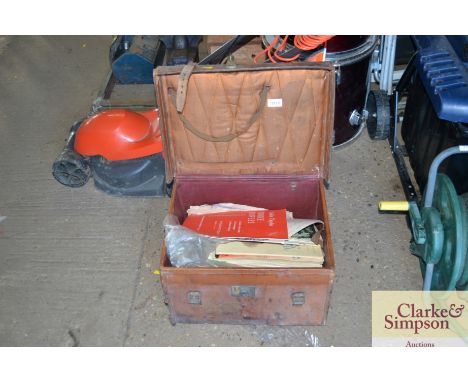 A leather trunk and contents of sheet music