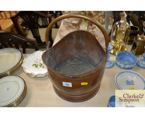 A copper and brass coal helmet