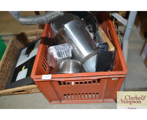 A box containing various kitchenalia together with a basket of prints