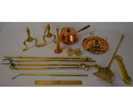 Brass and copper including a small hunting horn, fire dogs, hearth tools, ruler etc