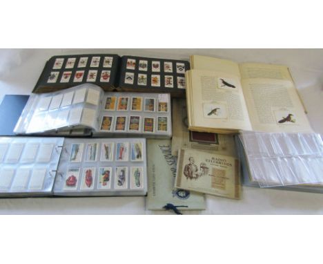 Large quantity of cigarette cards in albums inc South African birds and flora, Radio Celebrities second series & Coronation H
