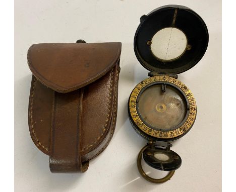 A FIRST WORLD WAR BARKER AND SON COMPASS. A compass by F. Barker &amp; Son, London 1918, No. 337 in leather case, the case ma