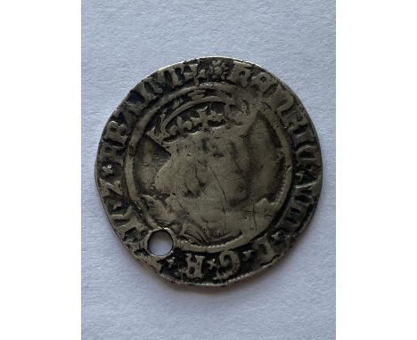 A HENRY VIII GROAT. A Henry VIII hammered silver groat, young crowned portrait r. mm. possibly rose for Canterbury. pierced, 