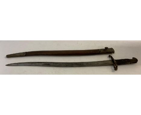 AN 1856 PATTERN YATAGHAN BAYONET AND SCABBARD. With a 58cm serpentine pointed and partially fullered blade stamped S8 and BR2