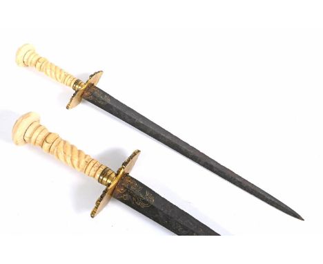 A LATE 18TH OR EARLY 19TH CENTURY IVORY HANDLED KNIFE. A knife or dagger with a 22cm tapering pointed blade with all over scr