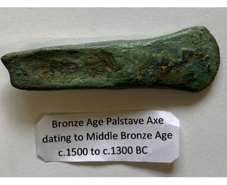 A MIDDLE BRONZE AGE PALSTAVE AXE. Middle Bronze Age Copper-Alloy Palstave Axe, c.1500-1300 B.C. The cast axe with a tapered b