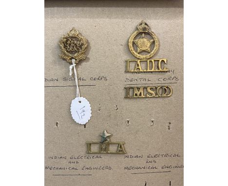A SELECTION OF INDIAN ARMY INSIGNIA TO INCLUDE WORLD WAR II ERA. A selection of badges and buttons to include various Gurkha 