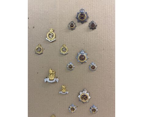 A COLLECTION OF ROYAL ARMY SERVICE CORPS AND OTHER BADGES. A collection of RASC badges to include cap and collar badges, Eliz