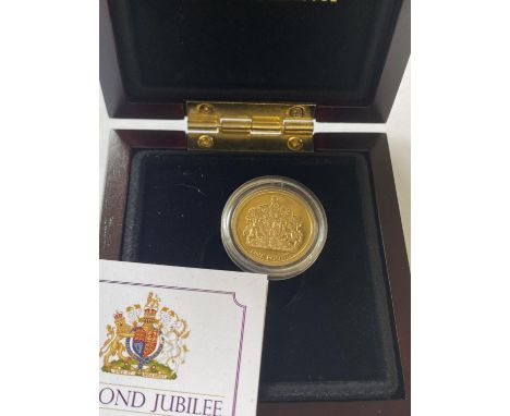 A QUEEN ELIZABETH II PROOF ONE POUND COIN. A Queen Elizabeth II Diamond Jubilee Proof Jersey One pound coin, encapsulated and