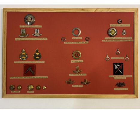 A COLLECTION OF 11TH SIKH REGIMENT BADGES&lt; BUTTONS AND PATCHES. A collection of buttons, badges to include a 1st Bn K.G.O.