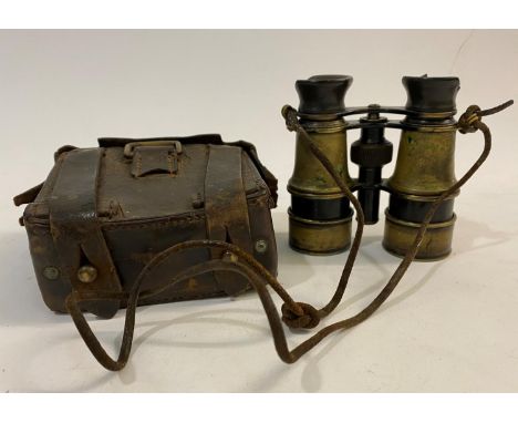 A BRASS BODIED GUN SIGHT BY OTTWAY AND Co AND GERMAN BINOCULARS. A brass bodied gun sight by W. Ottway and Co. Ealing 1909, 5