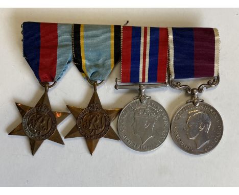 A SECOND WORLD WAR LONG SERVICE GROUP OF FOUR TO AN RAF PRISONER OF WAR. A group of four comprising 1939/45 and Air Crew Euro