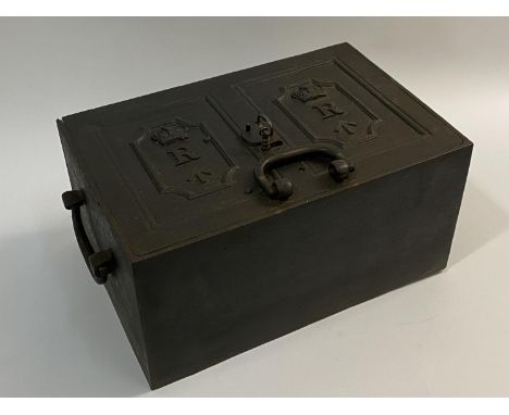 A VICTORIAN MILITARY REVENUE STRONG BOX. A Cast Iron Strong box and key, the rectangular lid with two panels with Queen's Cro