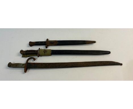 A WILKINSON 1888 PATTERN BAYONET AND TWO OTHERS. An 1888 pattern bayonet with a 30.5xm pointed double edged blade marked 'Wil