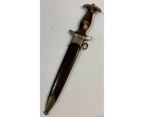 A SECOND WORLD WAR GERMAN SA DAGGER AND SCABBARD BY EICKHORN. An SA dagger with a 22cm pointed blade with inscription 'Alles 