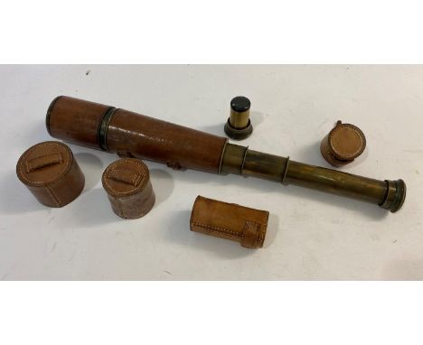 A FIRST WORLD WAR ARMY SIGNALLING TELESCOPE BY PARKER AND BISLEY. A three draw brass telescope with brass cover and caps to e