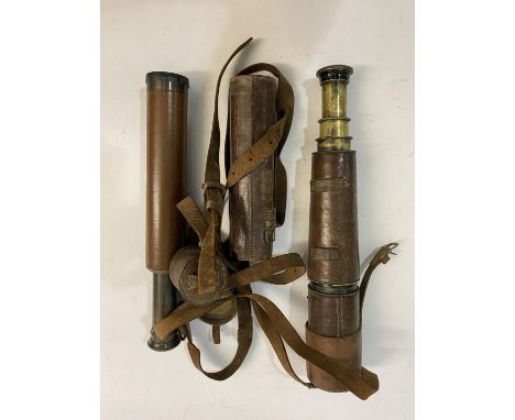 A FIRST WORLD WAR TELESCOPE AND TWO OTHERS. A World War One telescope marked with a government arrow and 'TT &amp; H Ltd No.3